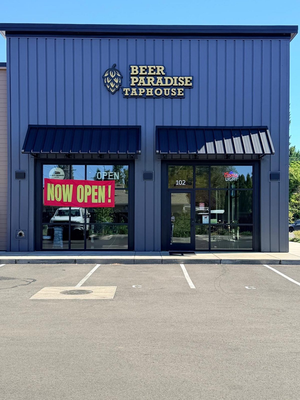 The Beer Paradise Taphouse storefront sign